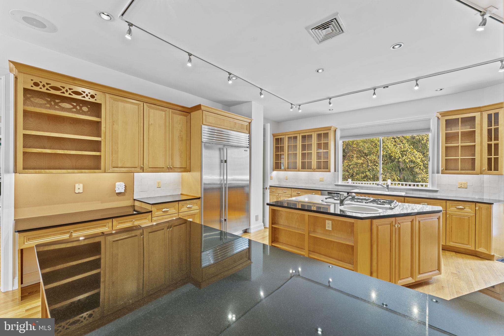 841 Mt Moro Road Villanova, PA 19085 - Photo 20 of 63 a kitchen with a sink stove and cabinets
