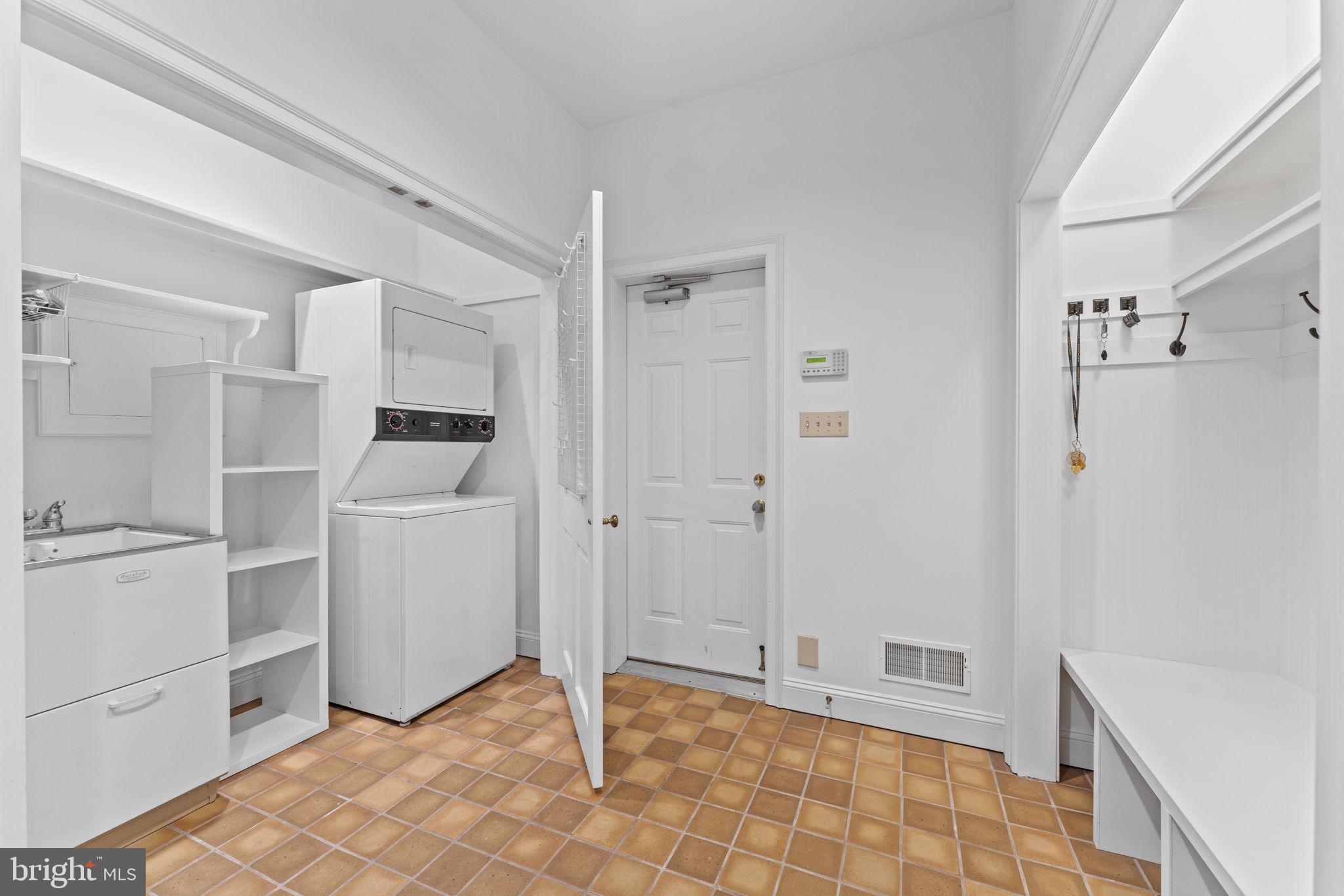 841 Mt Moro Road Villanova, PA 19085 - Photo 24 of 63 a view of a storage & utility room with closet dryer and washer