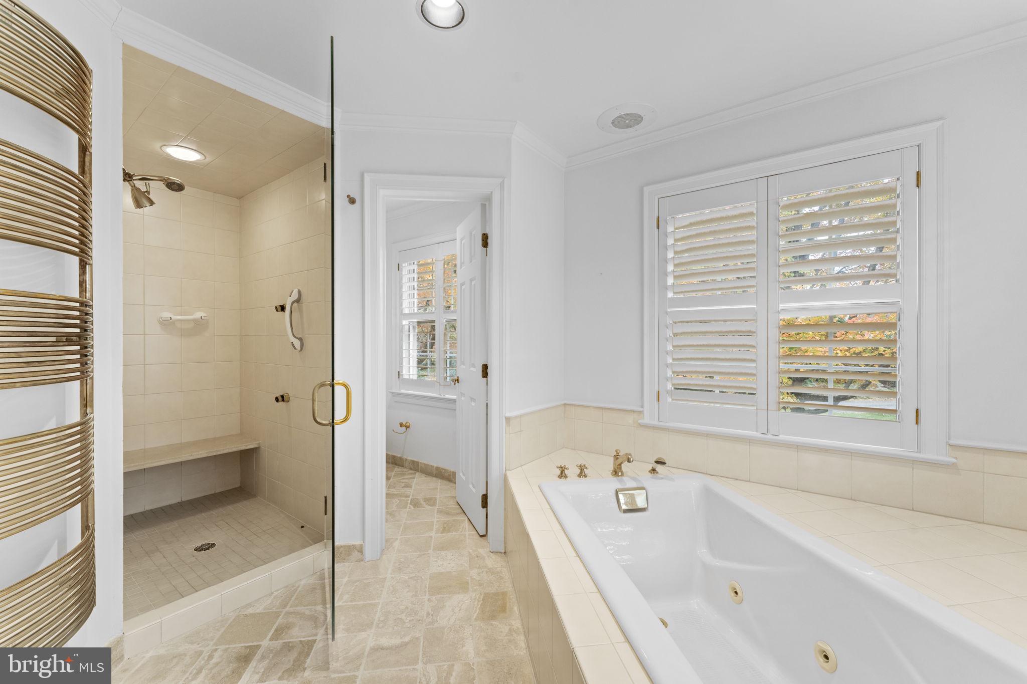 841 Mt Moro Road Villanova, PA 19085 - Photo 30 of 63 a bathroom with a bathtub and a shower