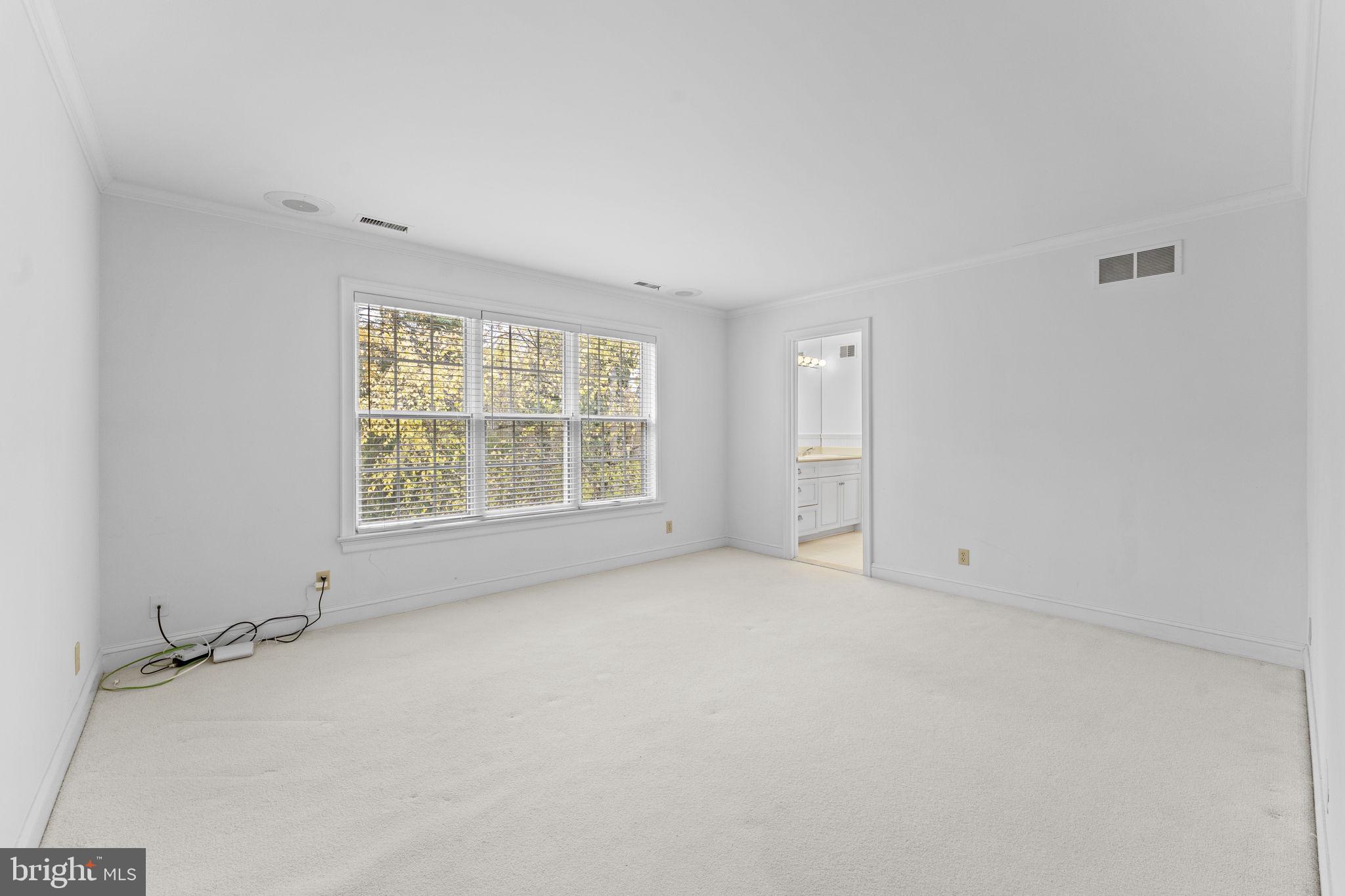 841 Mt Moro Road Villanova, PA 19085 - Photo 31 of 63 an empty room with windows