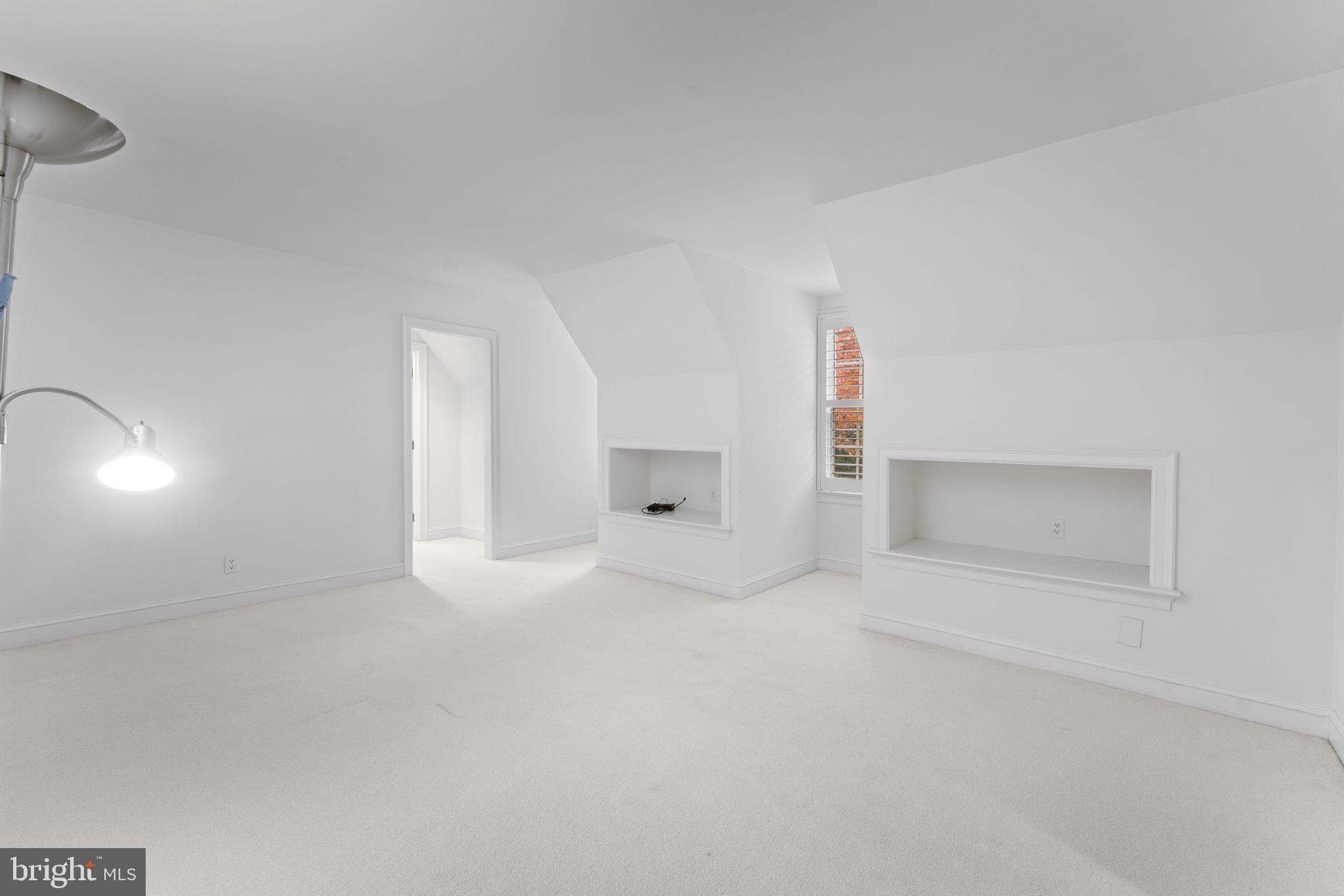 841 Mt Moro Road Villanova, PA 19085 - Photo 35 of 63 a view of empty room with a fireplace