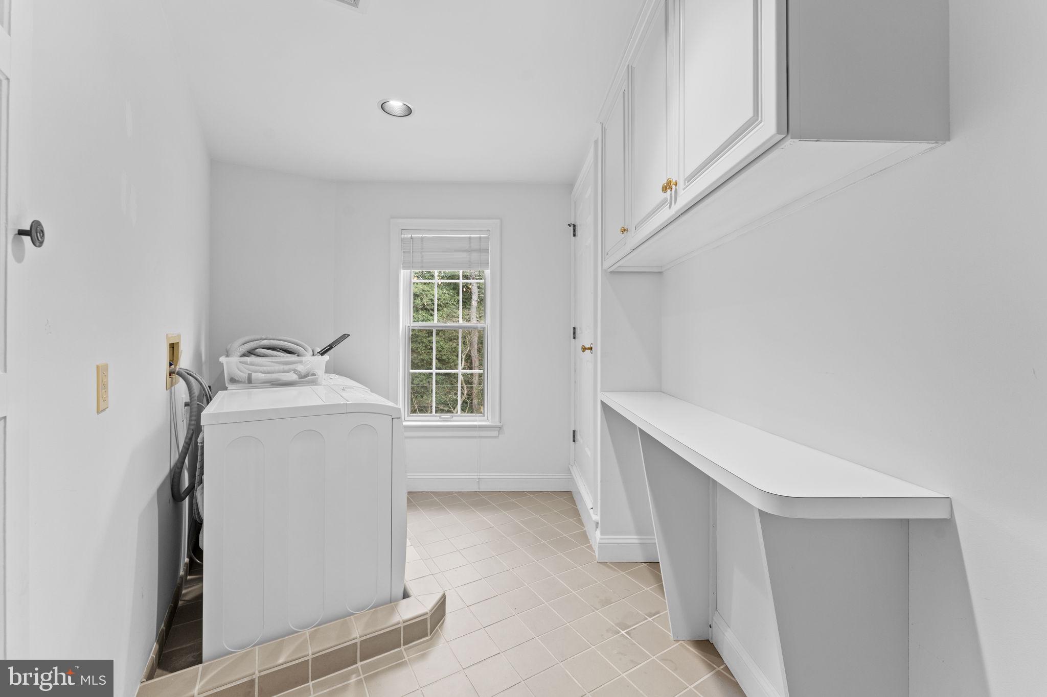 841 Mt Moro Road Villanova, PA 19085 - Photo 37 of 63 a utility room with dryer and washer