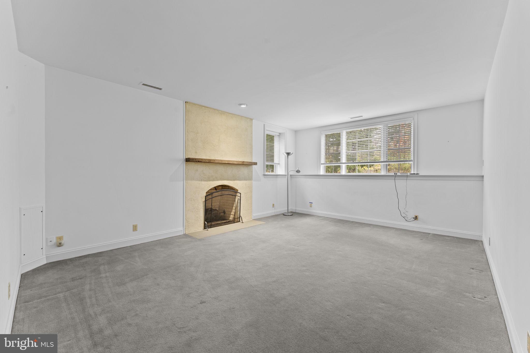 841 Mt Moro Road Villanova, PA 19085 - Photo 38 of 63 a view of a livingroom with furniture and a fireplace