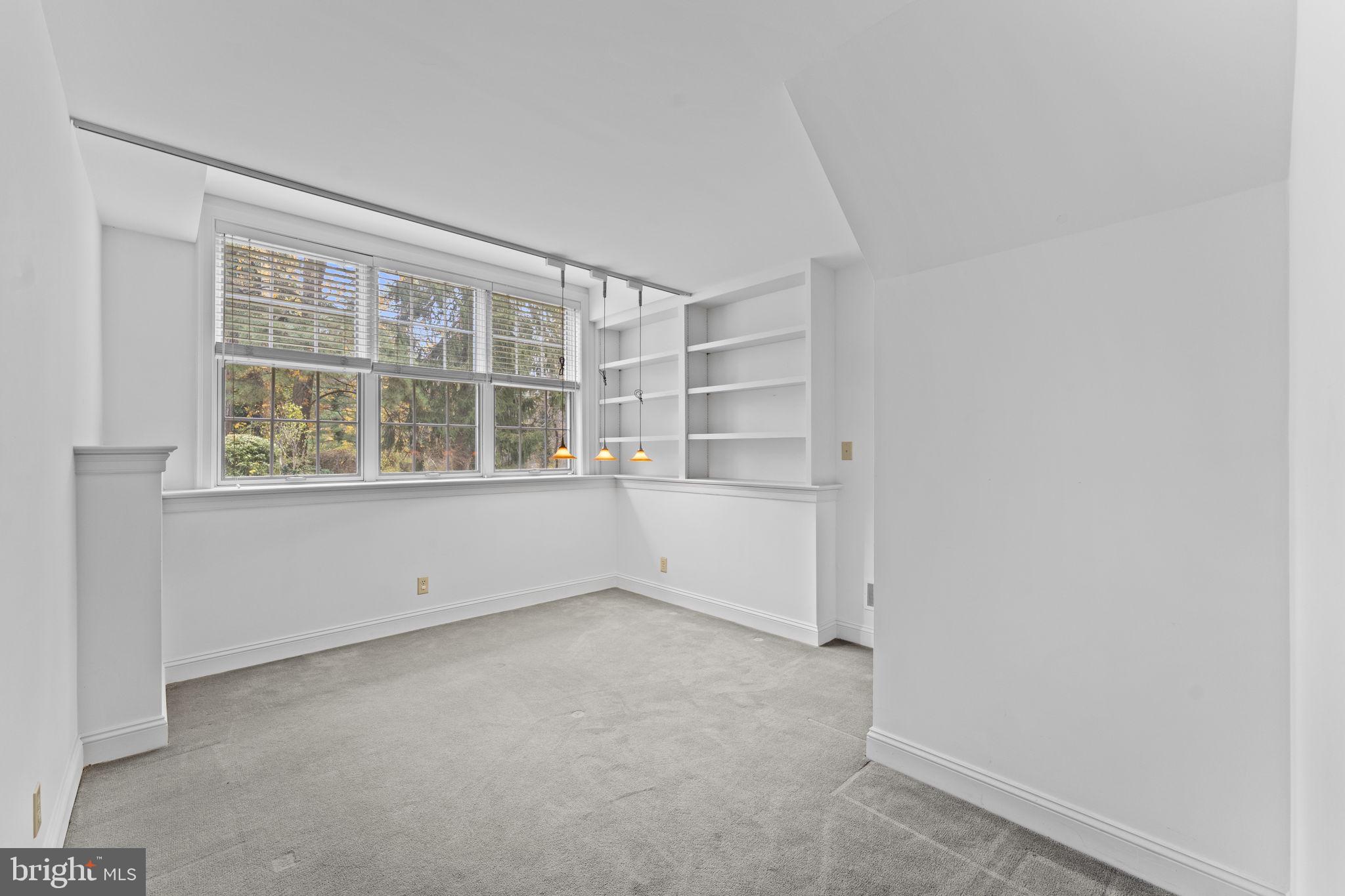 841 Mt Moro Road Villanova, PA 19085 - Photo 39 of 63 an empty room with cabinet