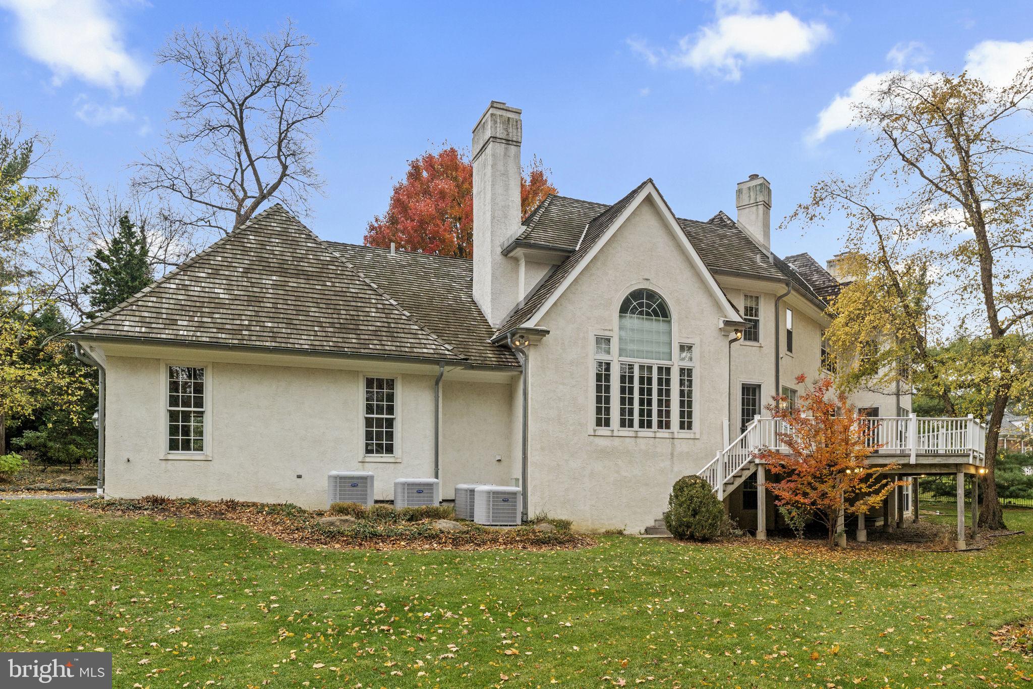 841 Mt Moro Road Villanova, PA 19085 - Photo 46 of 63 a front view of a house with a yard