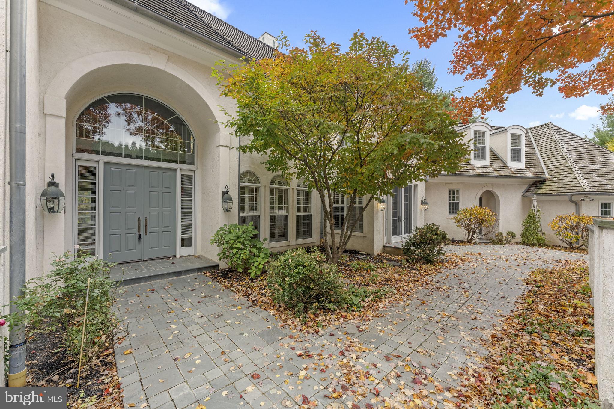 841 Mt Moro Road Villanova, PA 19085 - Photo 5 of 63 a front view of a house with a garden