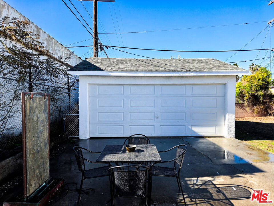1111 North Spring Avenue Compton, CA 90221 - Photo 8 of 28 a backyard of a house with table and chairs
