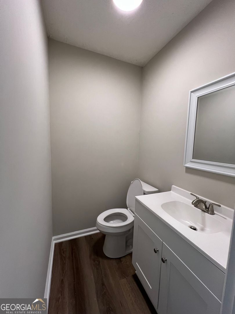 1695 East Broad Street, Unit A Athens, GA 30601 - Photo 12 of 13 a bathroom with a sink and a toilet