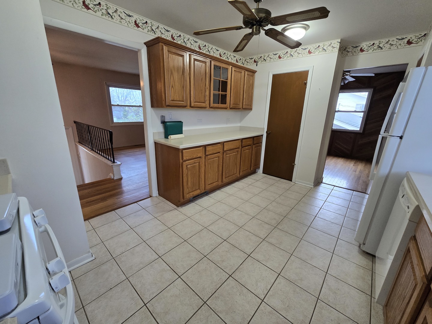 2075 Greenfield Road Hoffman Estates, IL 60169 - Photo 7 of 23 a kitchen with stainless steel appliances a sink and a refrigerator
