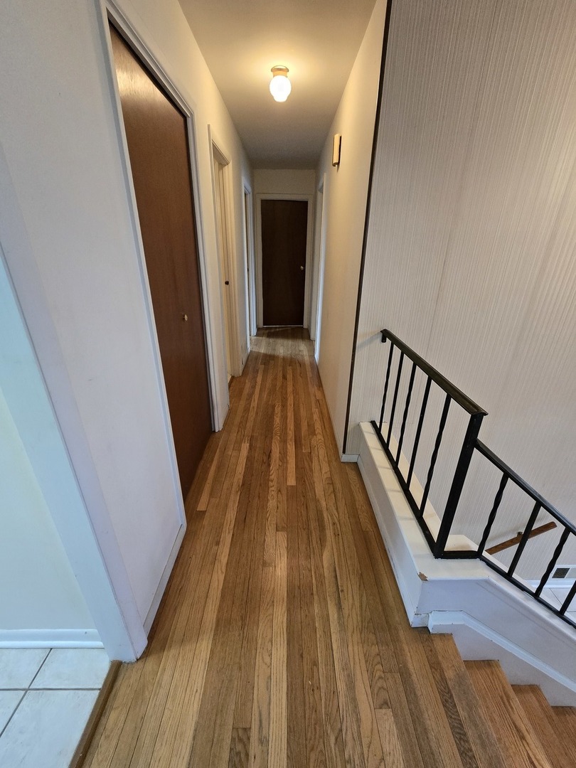 2075 Greenfield Road Hoffman Estates, IL 60169 - Photo 8 of 23 a view of a hallway from a hallway