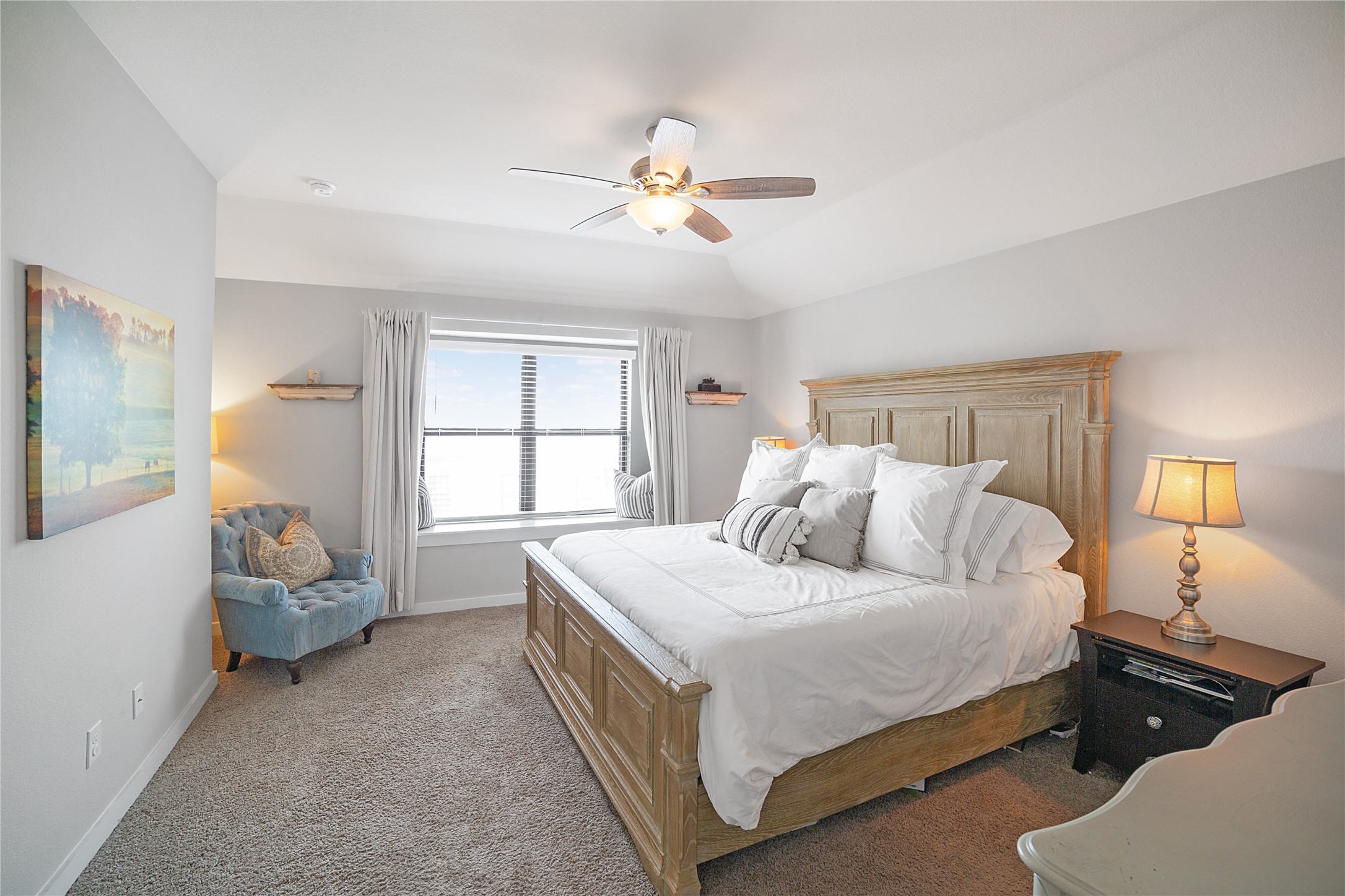 180 Waterside Road, Unit B Buda, TX 78610 - Photo 11 of 27 a bedroom with a bed and window