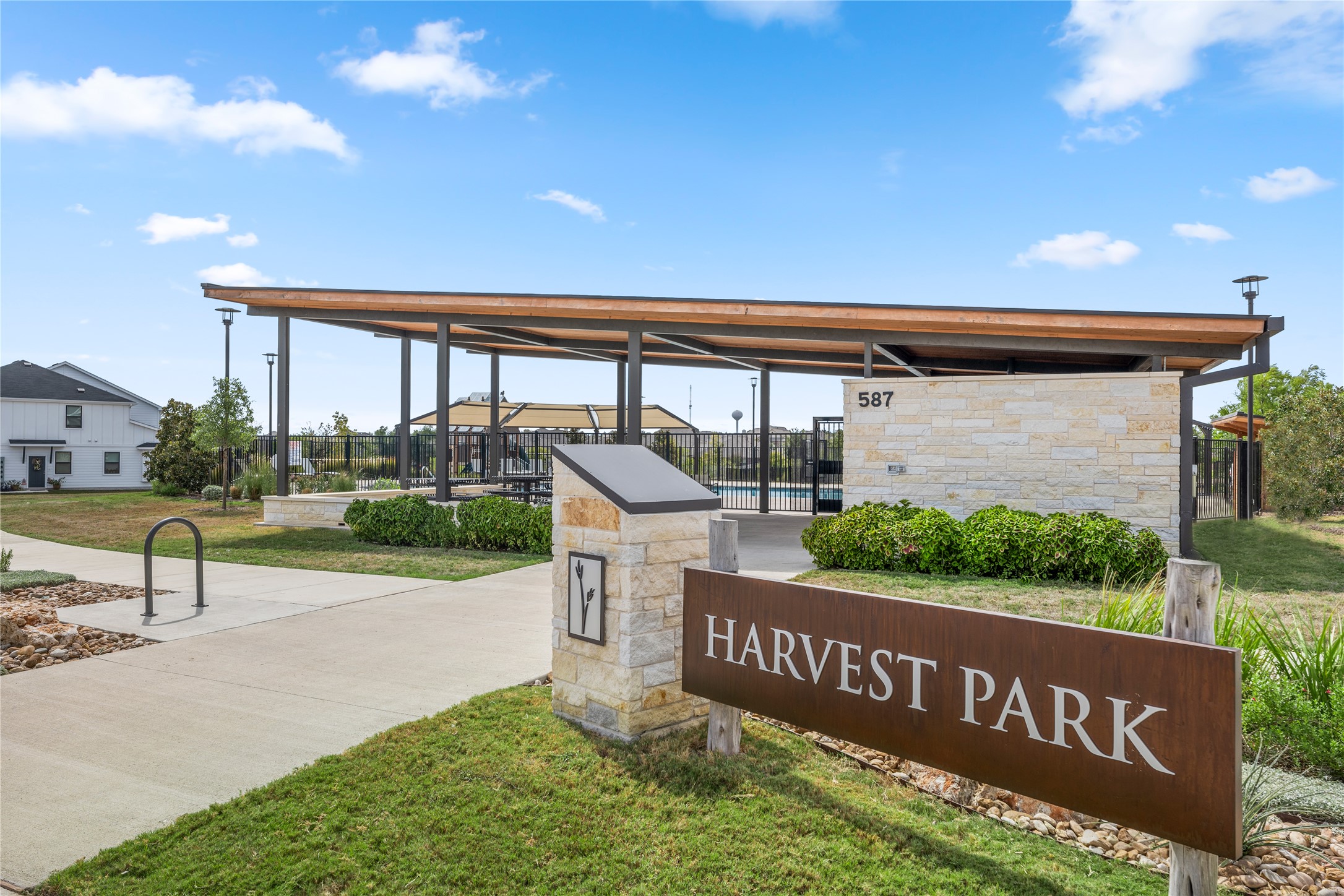 180 Waterside Road, Unit B Buda, TX 78610 - Photo 22 of 27 a view of a street with a sign board