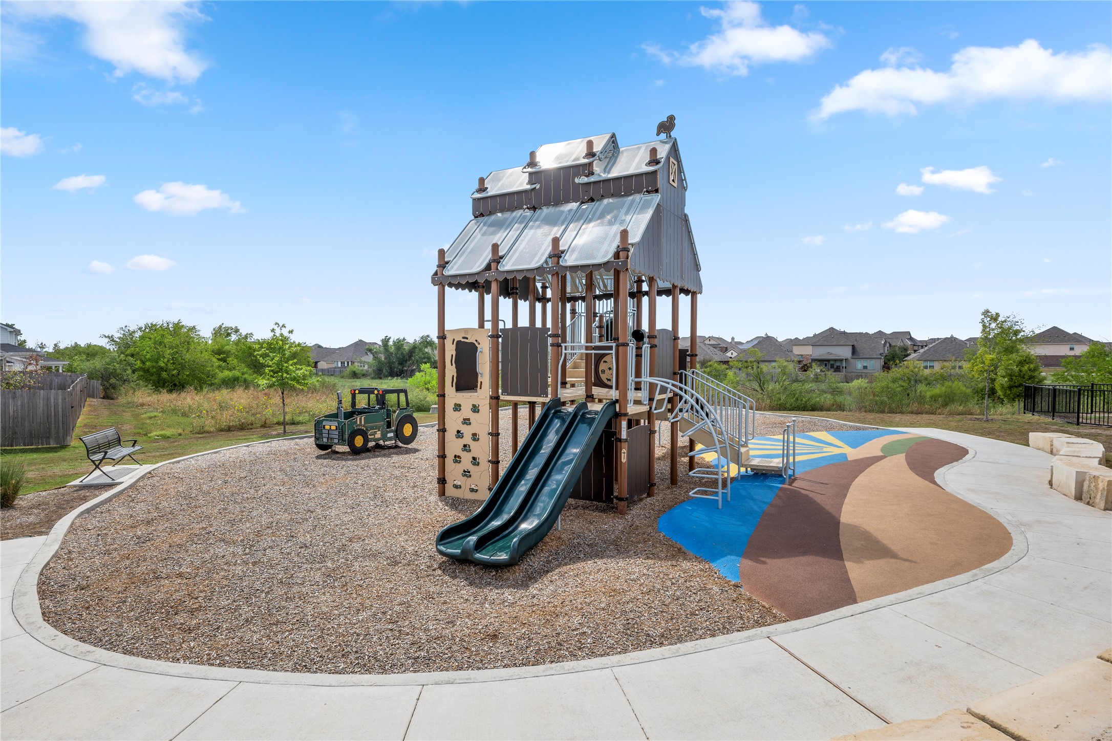 180 Waterside Road, Unit B Buda, TX 78610 - Photo 26 of 27 a view of a lake with a slide