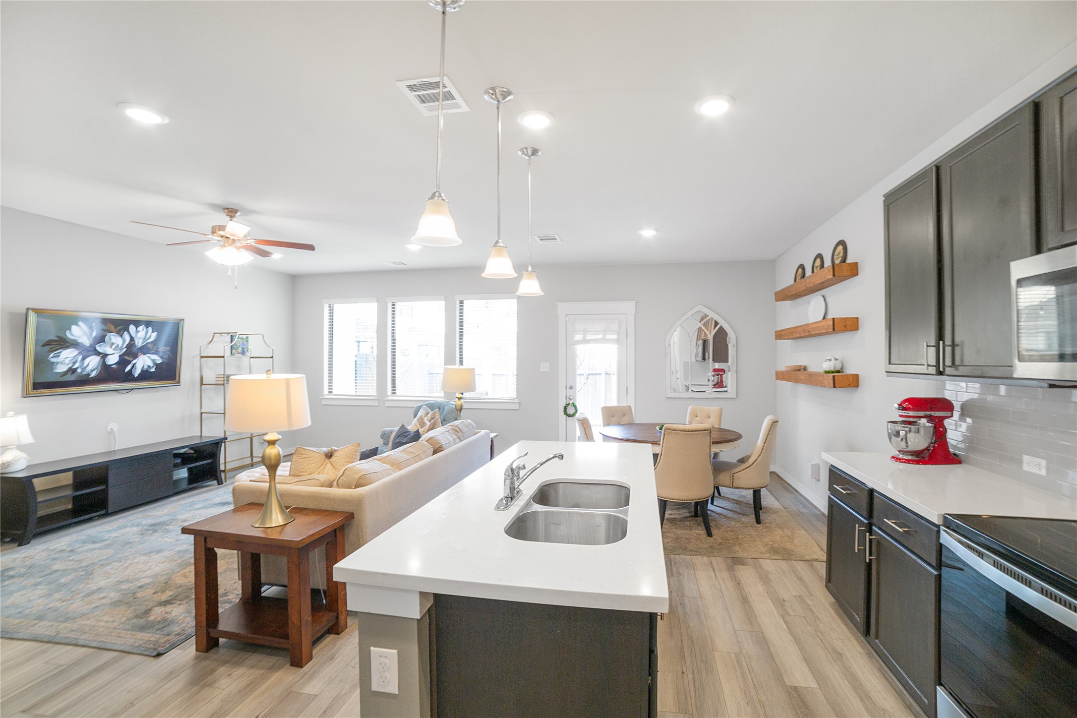 180 Waterside Road, Unit B Buda, TX 78610 - Photo 27 of 27 a large kitchen with a table and chairs