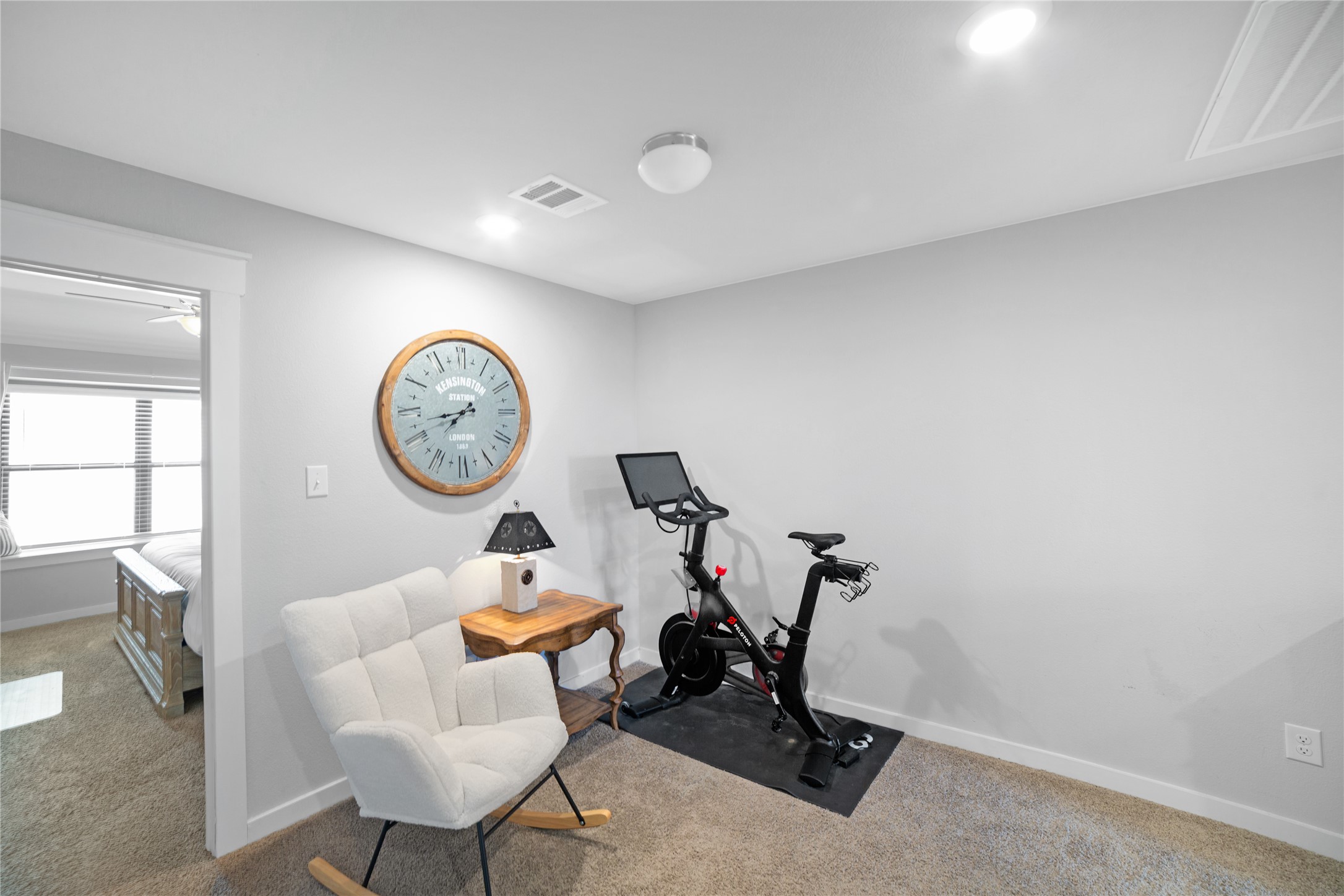 180 Waterside Road, Unit B Buda, TX 78610 - Photo 4 of 27 a view of a room with gym equipment