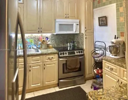 $240,000 | 427 Golden Isles Drive, Unit 7J, Hallandale Beach, FL 33009