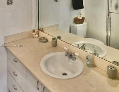 $240,000 | 427 Golden Isles Drive, Unit 7J, Hallandale Beach, FL 33009