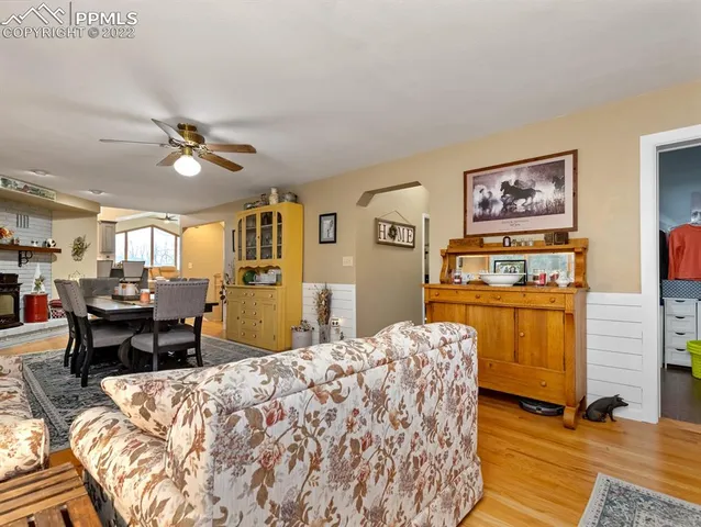 a bed room with a bed and a chandelier