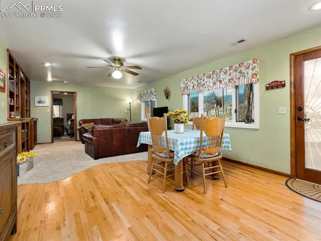 a view of a dining room with furniture