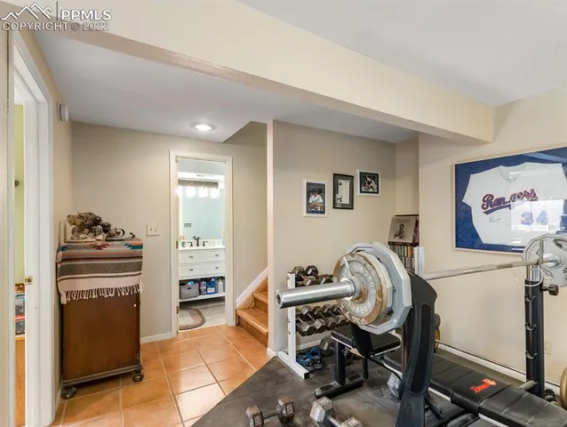 a workspace with table and chairs