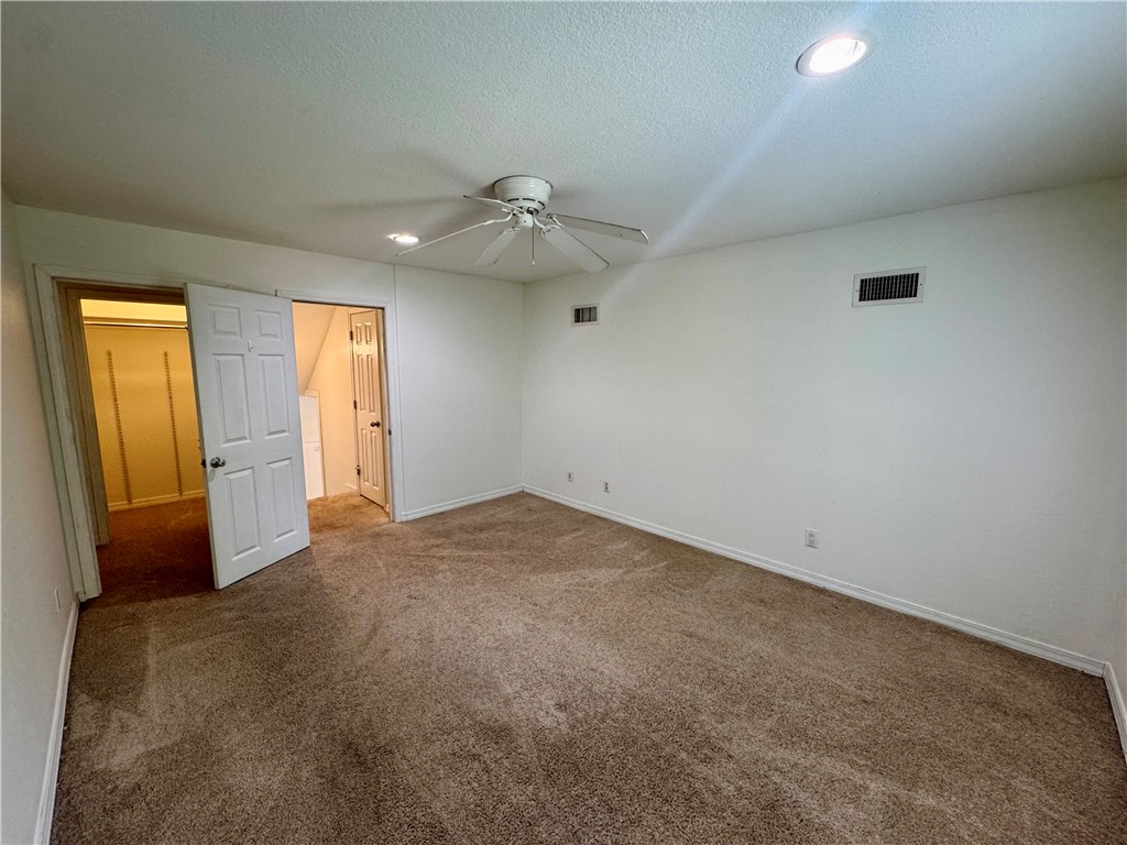 1197 Ridgeview Lane Russellville, AR 72802 - Photo 12 of 44 Carpeted room featuring white walls, a ceiling fan with integrated lighting, and recessed ceiling lights
