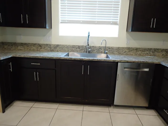 a bathroom with a sink and mirror