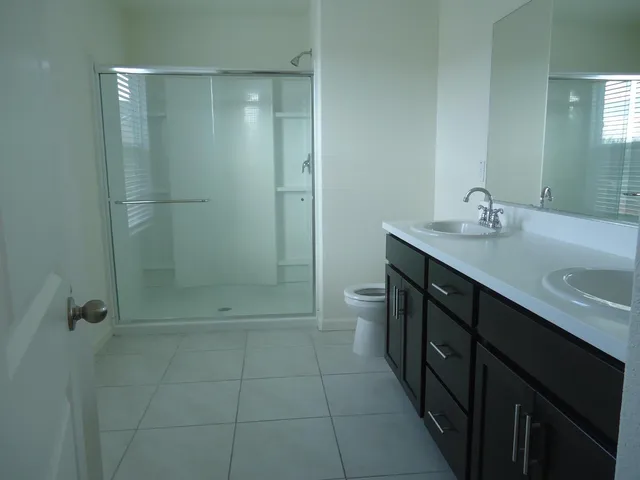 a view of a backyard with garden