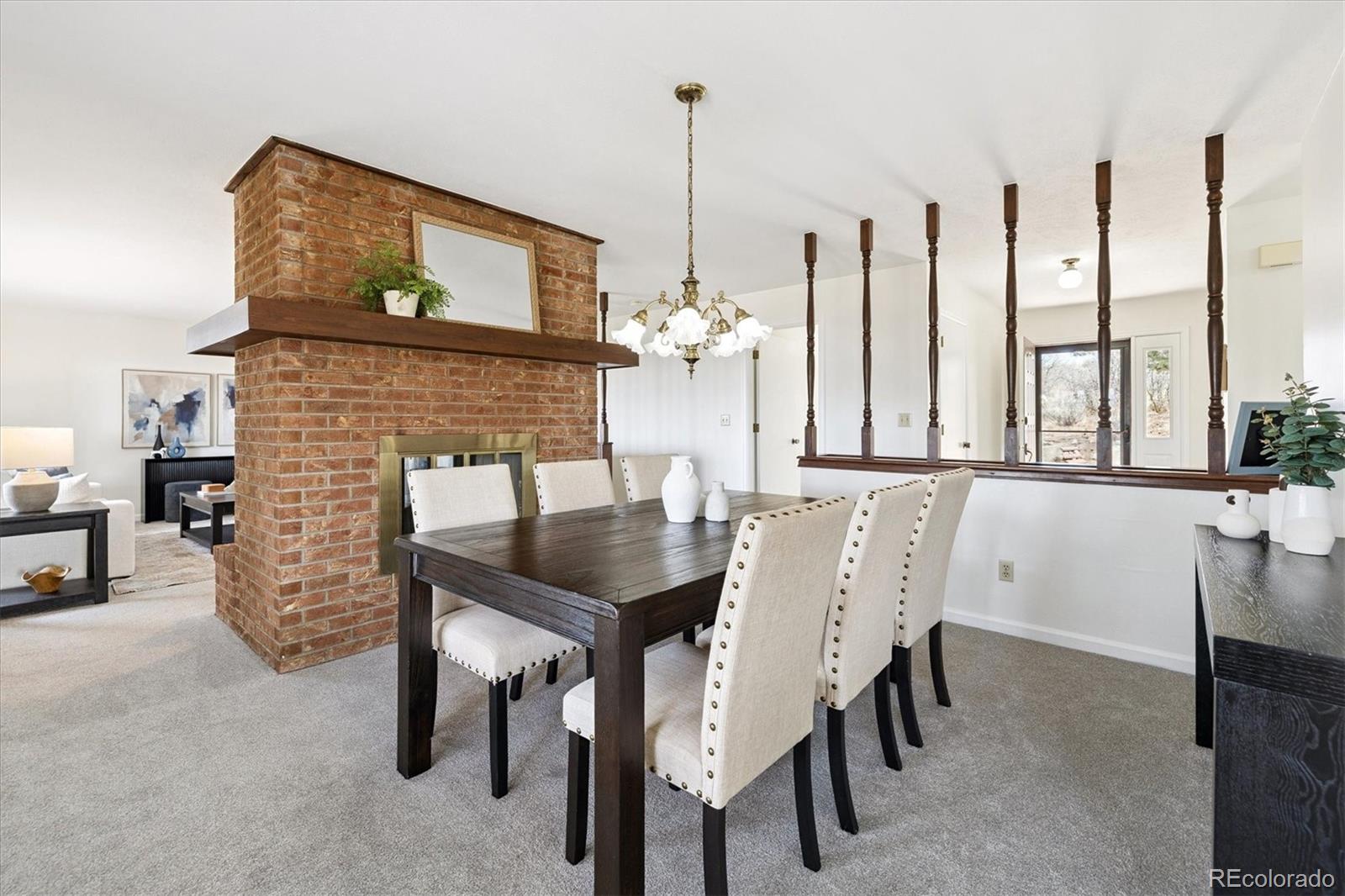 1482 North Perry Park Road Sedalia, CO 80135 - Photo 12 of 50 a dining room with furniture and window