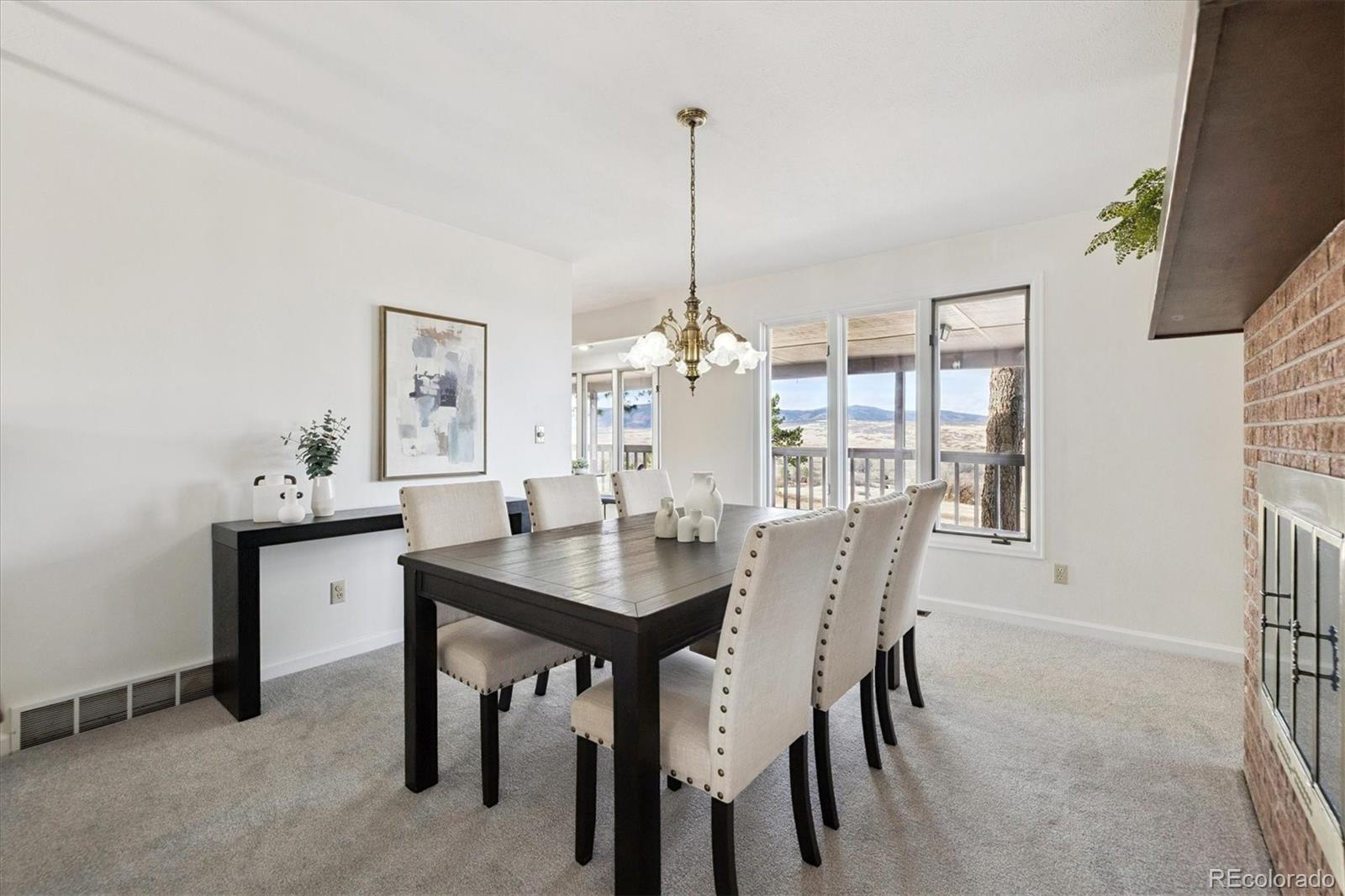 1482 North Perry Park Road Sedalia, CO 80135 - Photo 17 of 50 a dining room with furniture and window