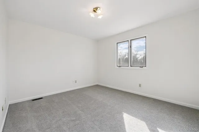 a bathroom with a sink a bathtub and a mirror