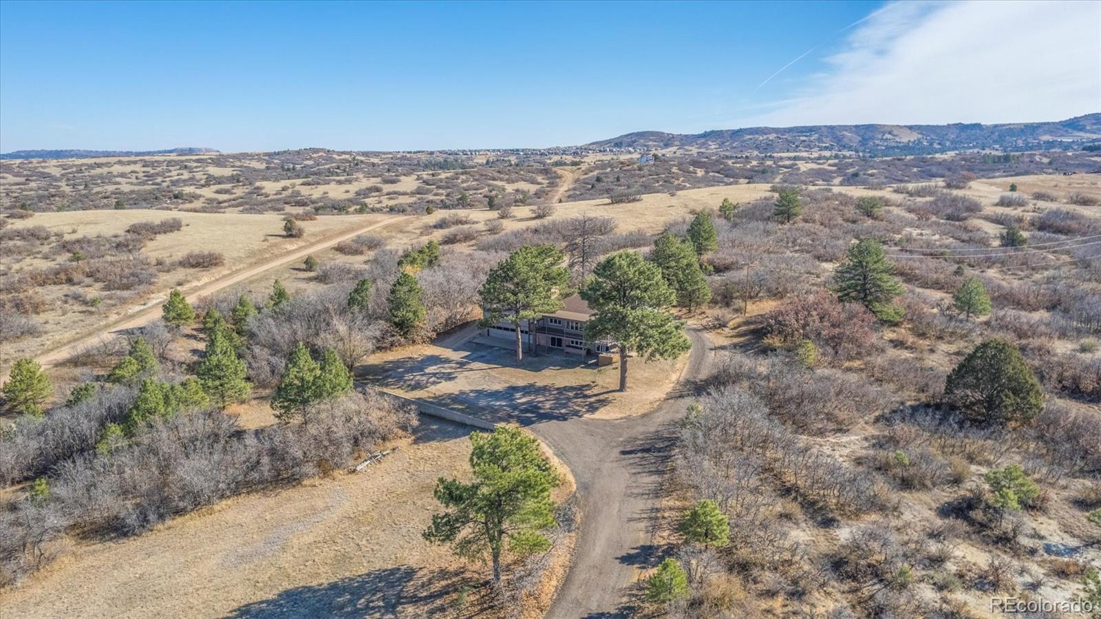 1482 North Perry Park Road Sedalia, CO 80135 - Photo 4 of 50 a view of city and mountain