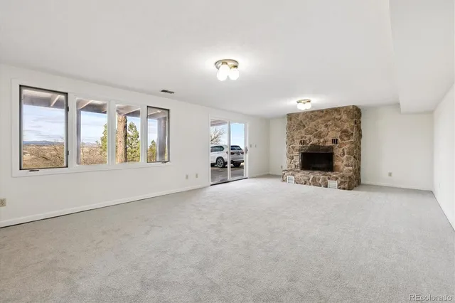 an empty room with windows