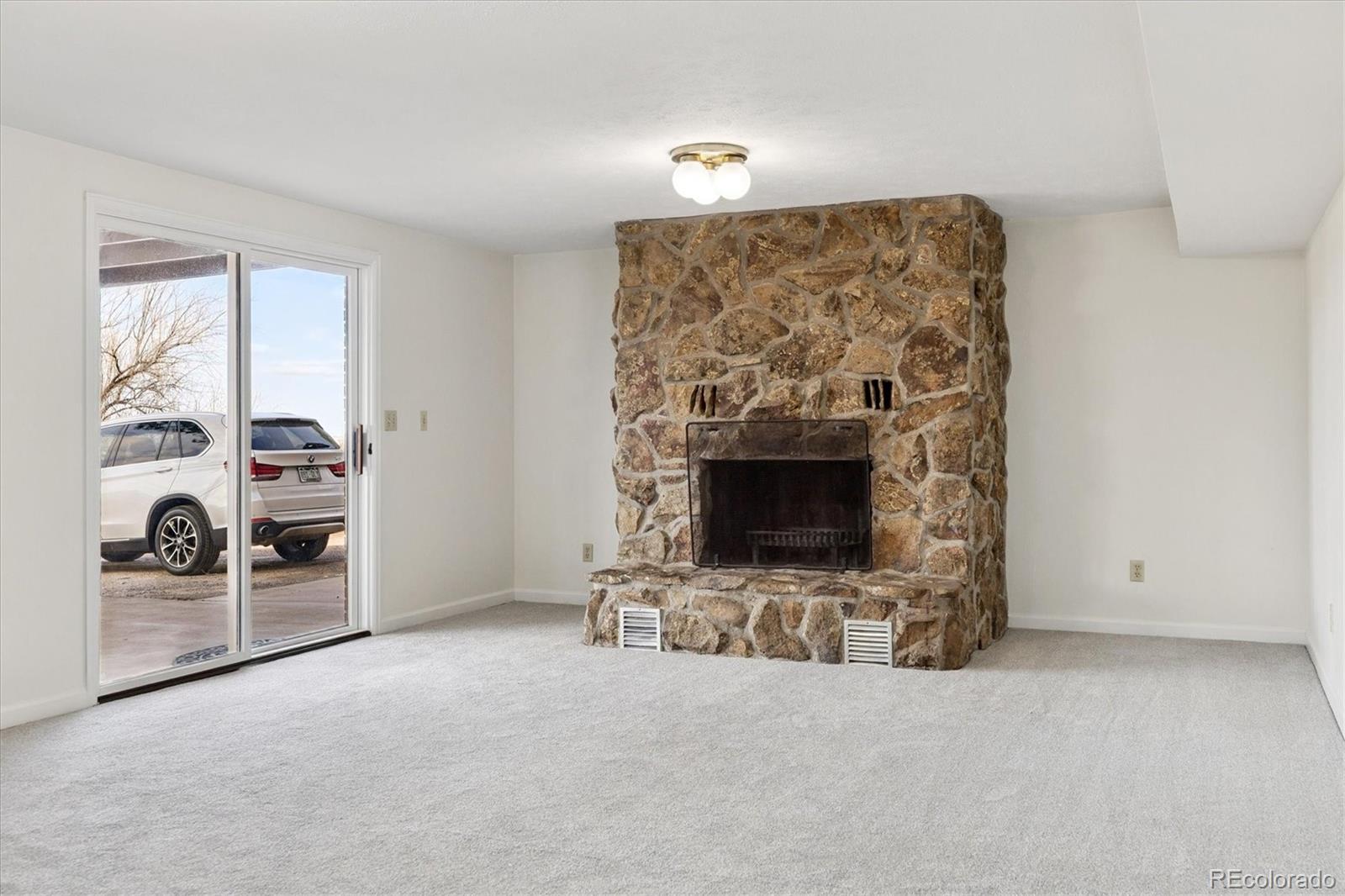 1482 North Perry Park Road Sedalia, CO 80135 - Photo 45 of 50 an empty room with windows