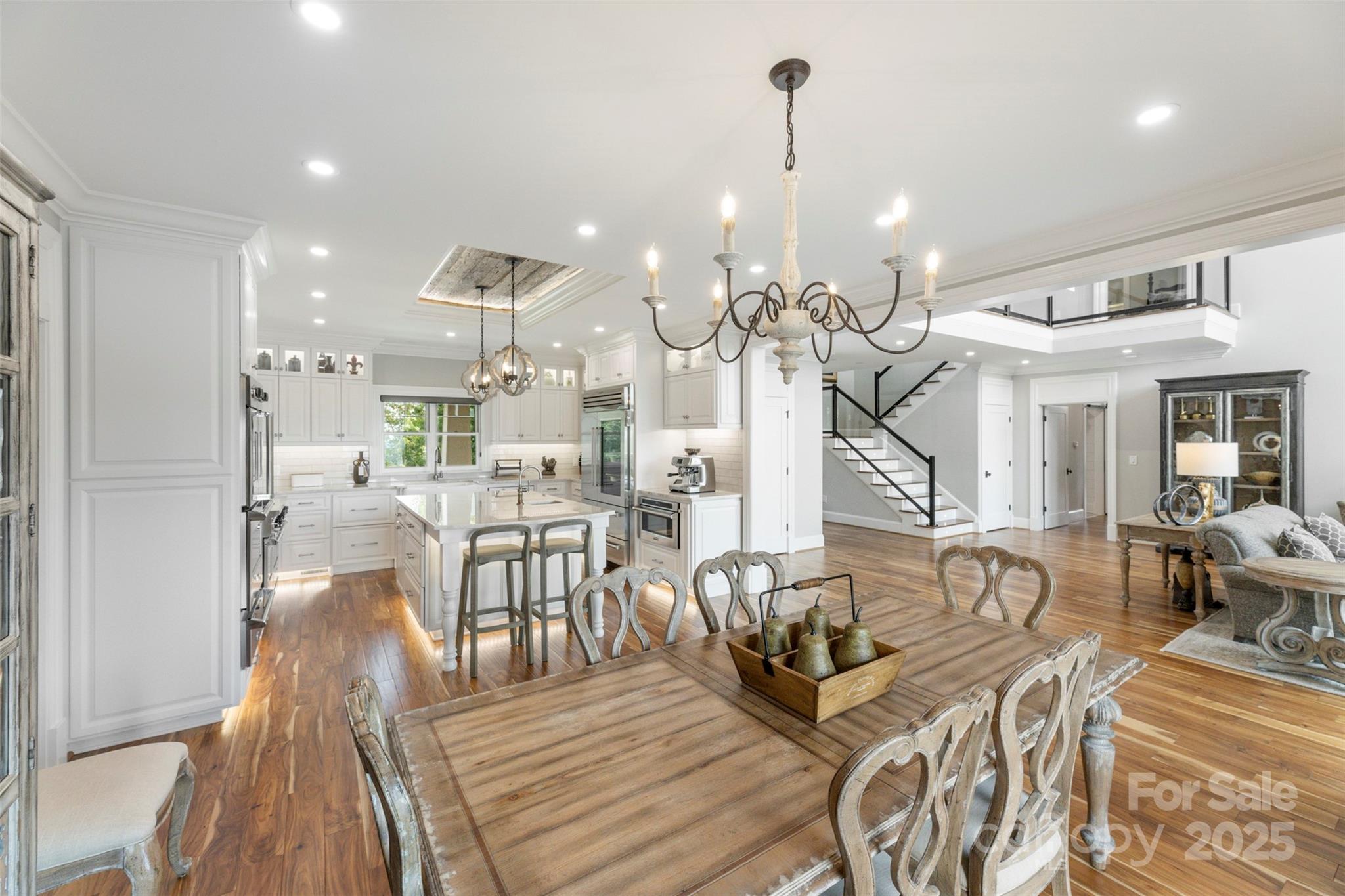 605 Recore Rdg Road Bessemer City, NC 28016 - Photo 12 of 48 a view of a dining room and livingroom with furniture wooden floor kitchen view