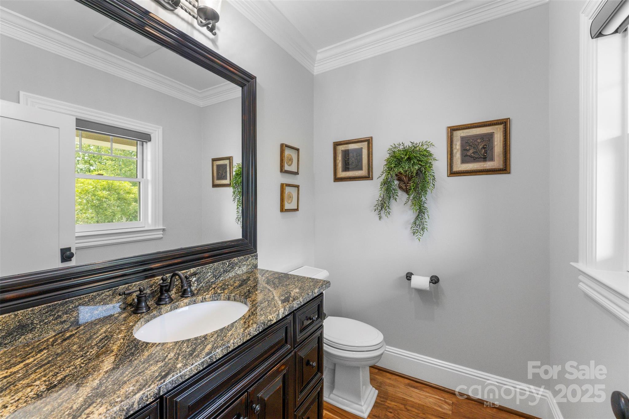 605 Recore Rdg Road Bessemer City, NC 28016 - Photo 16 of 48 a bathroom with a granite countertop sink mirror vanity and toilet