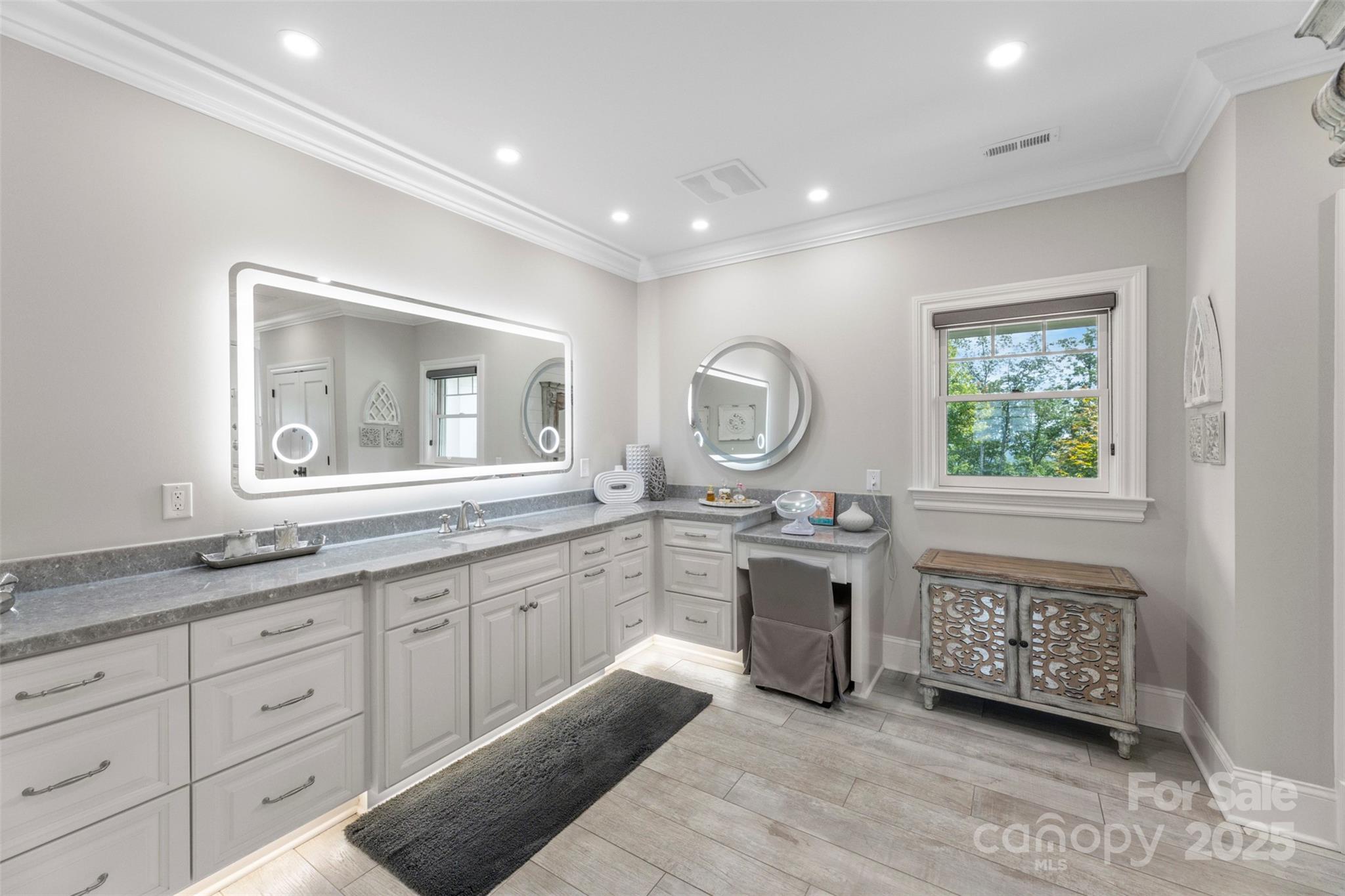 605 Recore Rdg Road Bessemer City, NC 28016 - Photo 21 of 48 a large bathroom with a window double vanity sink and a window