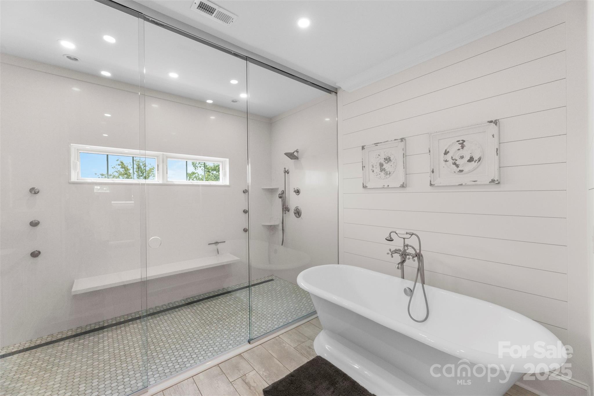 605 Recore Rdg Road Bessemer City, NC 28016 - Photo 22 of 48 a bathroom with a bathtub and shower