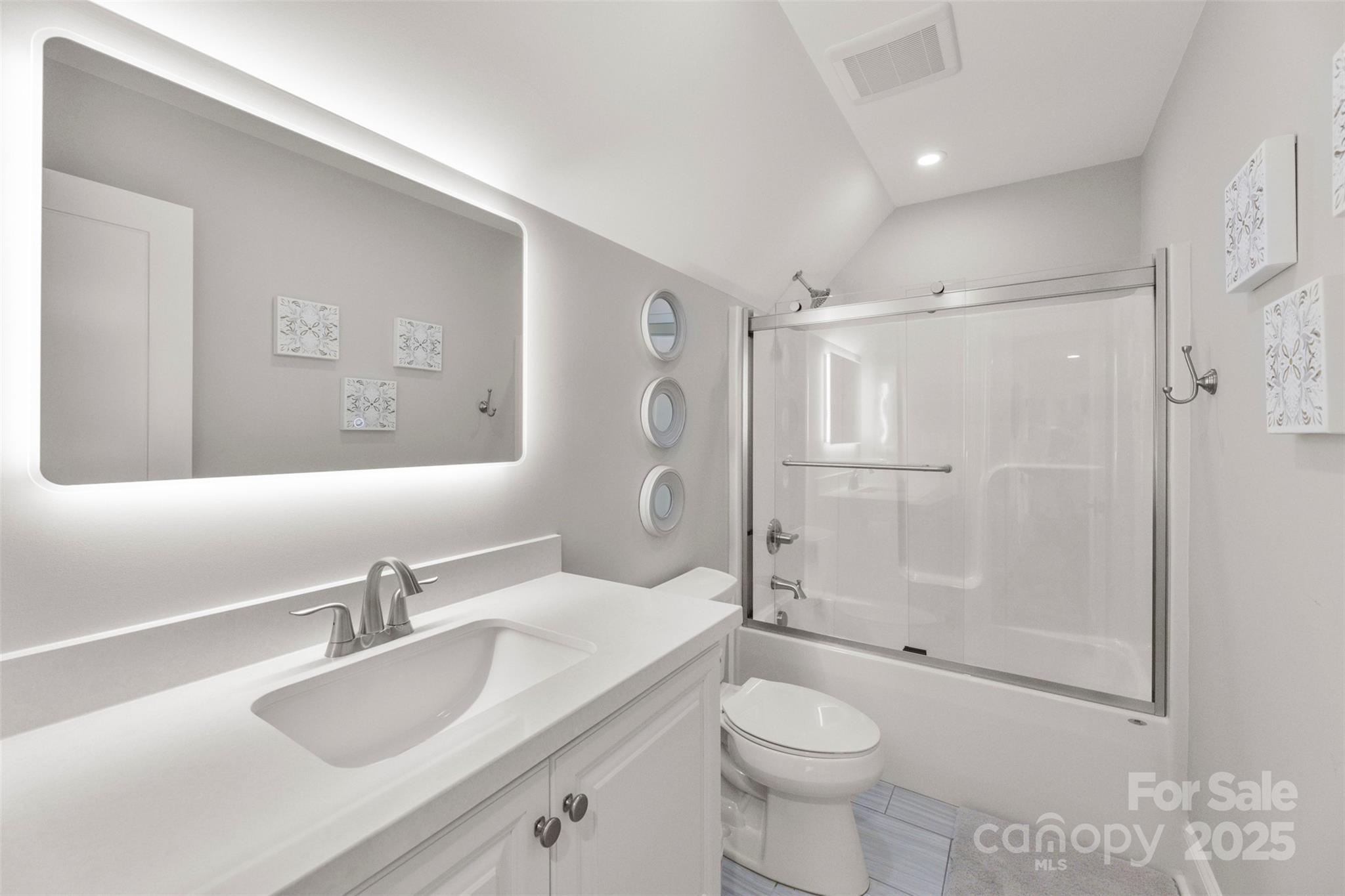 605 Recore Rdg Road Bessemer City, NC 28016 - Photo 28 of 48 a bathroom with a sink toilet and shower