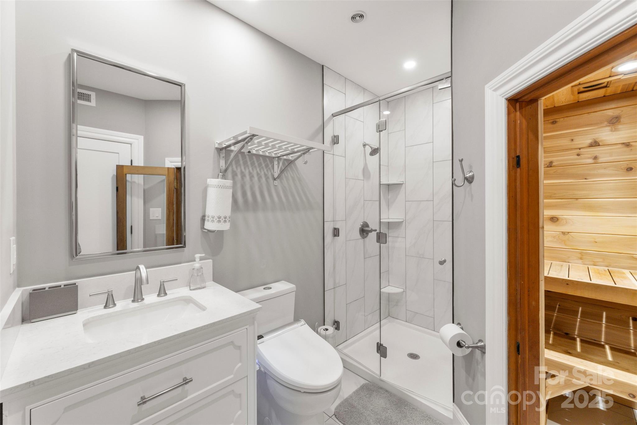 605 Recore Rdg Road Bessemer City, NC 28016 - Photo 33 of 48 a bathroom with a sink a toilet and shower