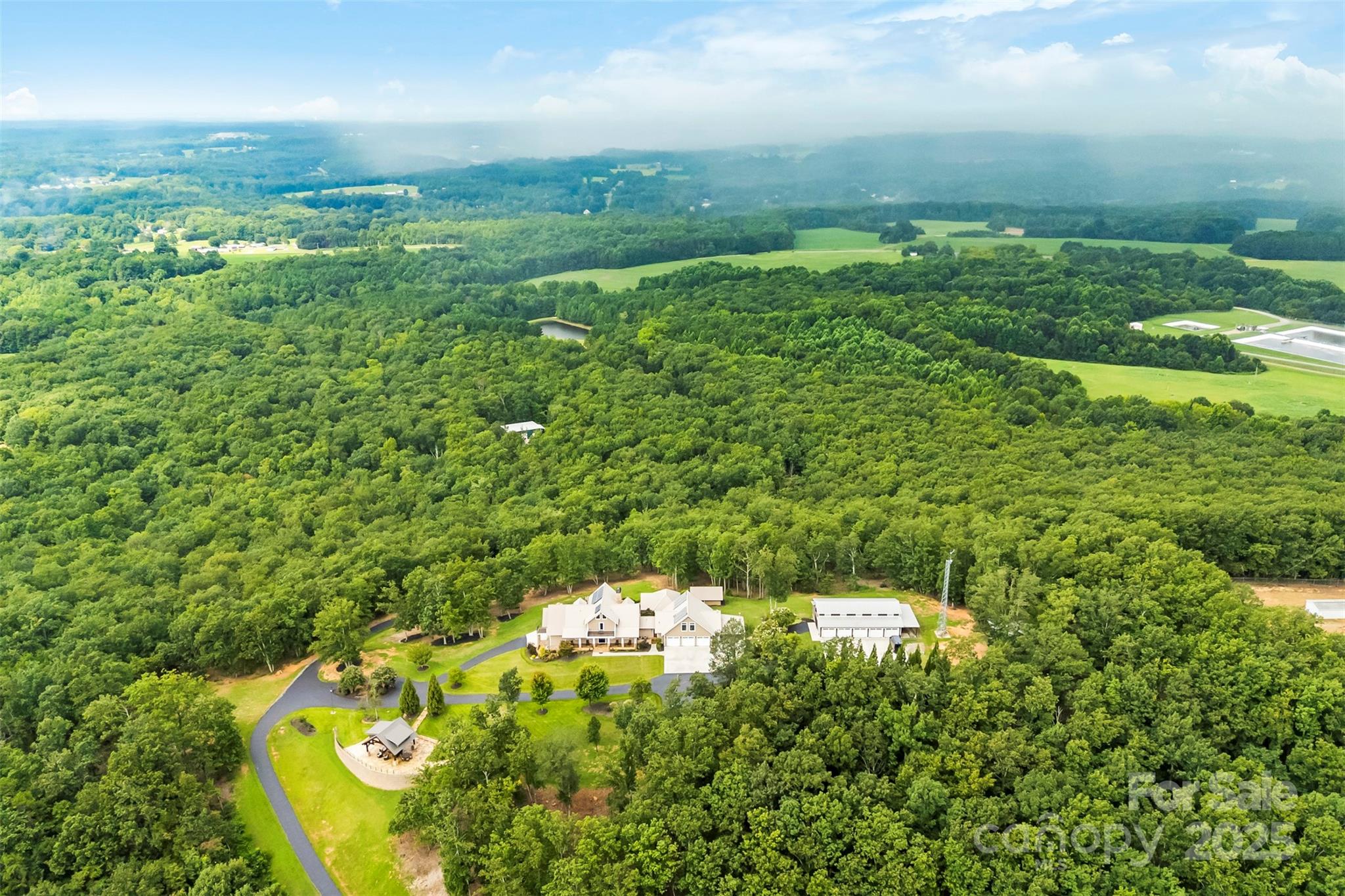 605 Recore Rdg Road Bessemer City, NC 28016 - Photo 4 of 48 a view of a garden with an outdoor space