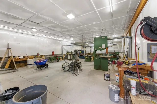 a view of a garage with lots of stuff