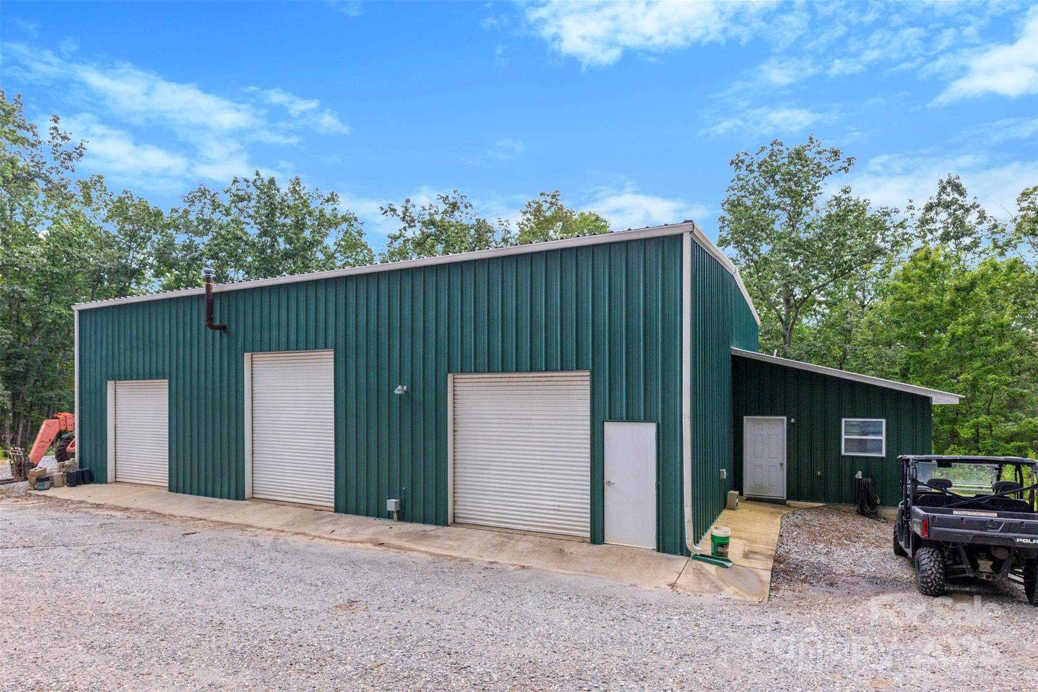 605 Recore Rdg Road Bessemer City, NC 28016 - Photo 45 of 48 a view of a house with backyard and trees