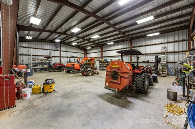 a view of parking garage with cars