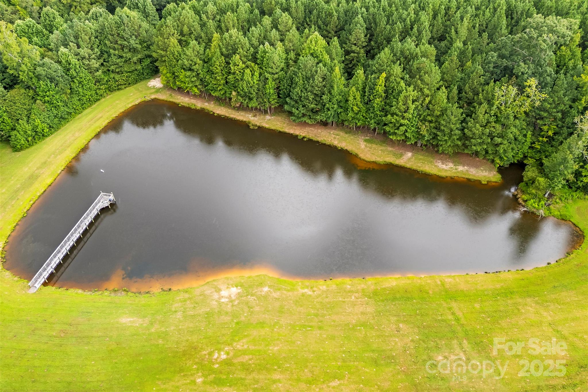605 Recore Rdg Road Bessemer City, NC 28016 - Photo 47 of 48 a view of a lake from a yard