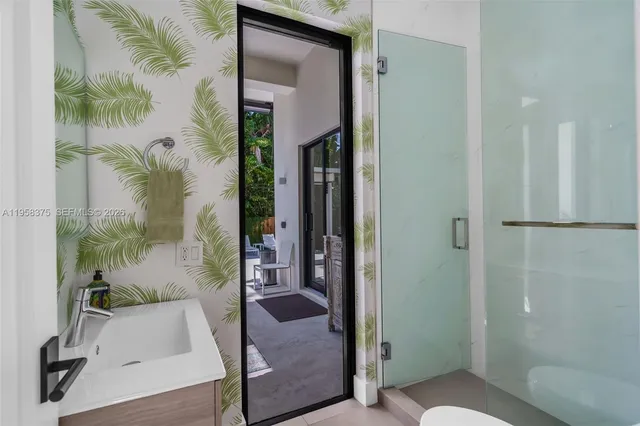 a view of a hallway with washer and dryer