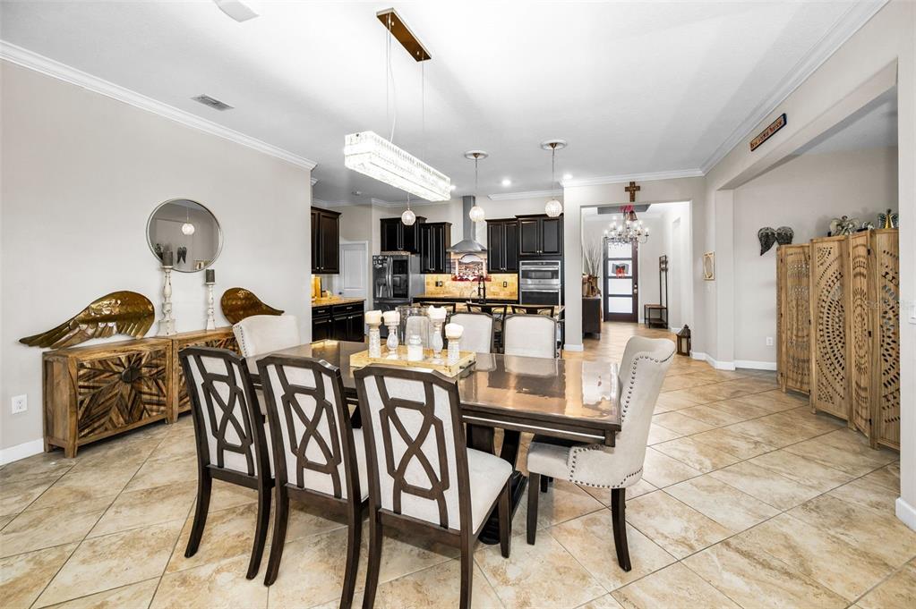 16833 Banner Shell Place Wimauma, FL 33598 - Photo 13 of 55 a view of a dining room with furniture