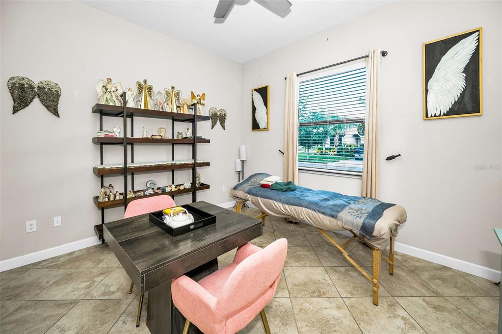 16833 Banner Shell Place Wimauma, FL 33598 - Photo 14 of 55 a living room with furniture and a window
