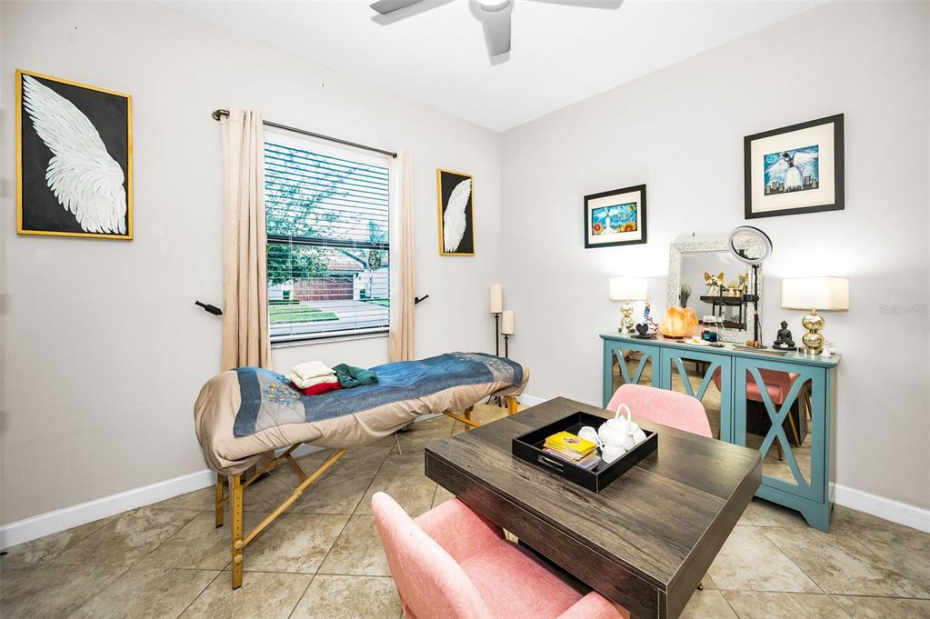 16833 Banner Shell Place Wimauma, FL 33598 - Photo 15 of 55 a living room with furniture and a table