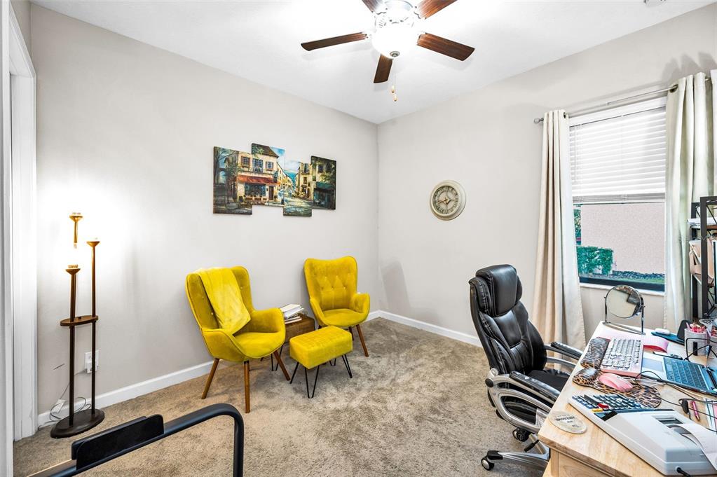 16833 Banner Shell Place Wimauma, FL 33598 - Photo 26 of 55 a view of a workspace with furniture and a window