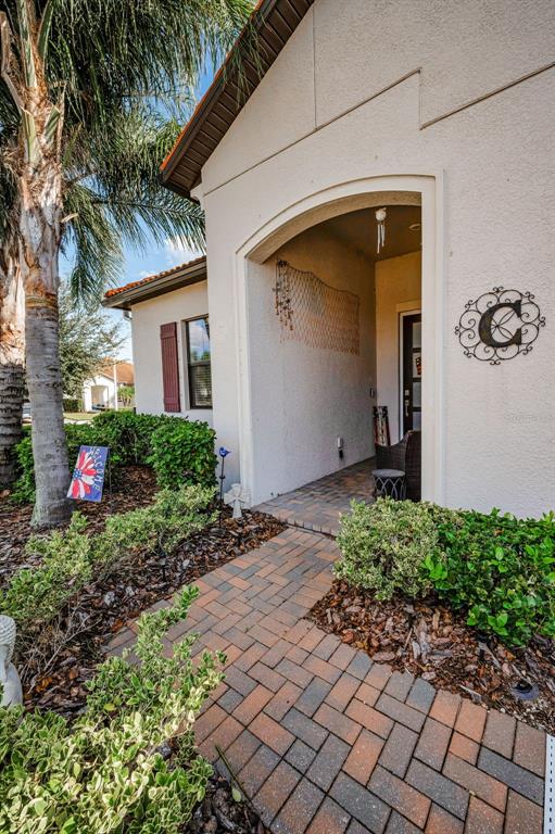 16833 Banner Shell Place Wimauma, FL 33598 - Photo 3 of 55 a front view of a house with swing